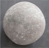 sfera in materiale lapideo