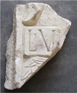 frammento di lastra marmorea con iscrizione