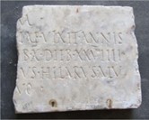 frammento di lastra marmorea con iscrizione